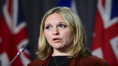 NDP warn of long delays in pay equity rule